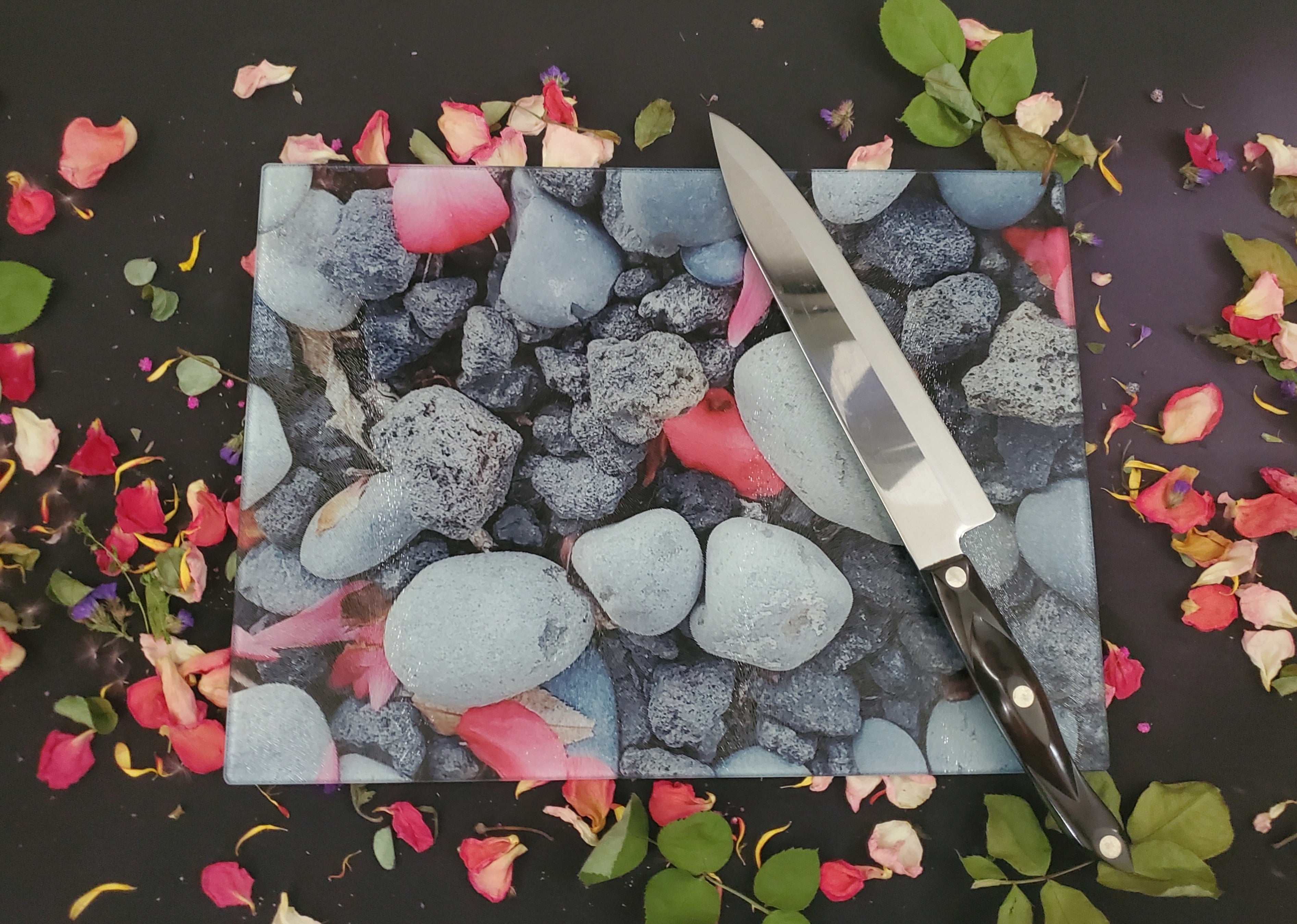 Pink Petals on River Rocks Glass Cutting Board | Floral Stone Kitchen Decor